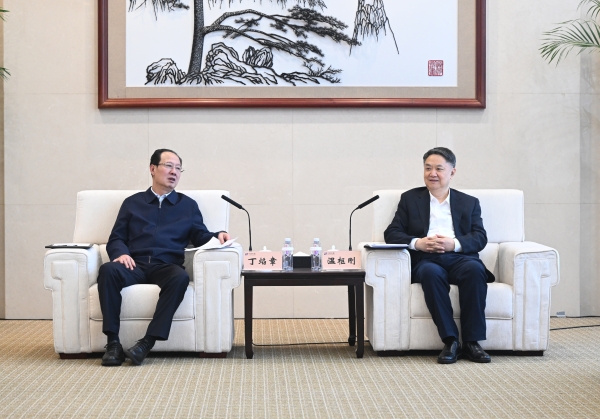 丁焰章與中國華能董事長、黨組書記溫樞剛會談